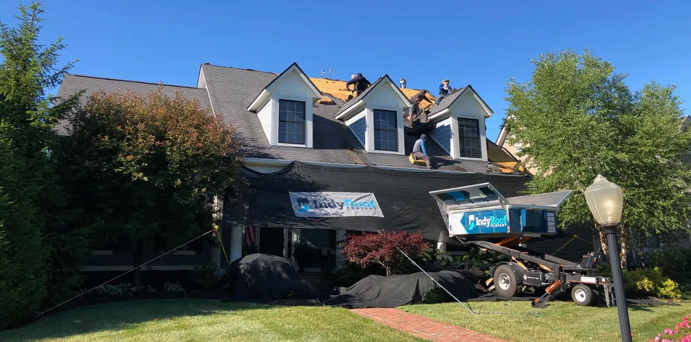 Tarping and dry-in on a Keeneland Park commercial roof